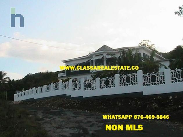 Photo #1 of 2 - Property For Sale at mandeville, Mandeville, Manchester, Jamaica. House with 6 bedrooms and 4 bathrooms at USD $400,000. #269.