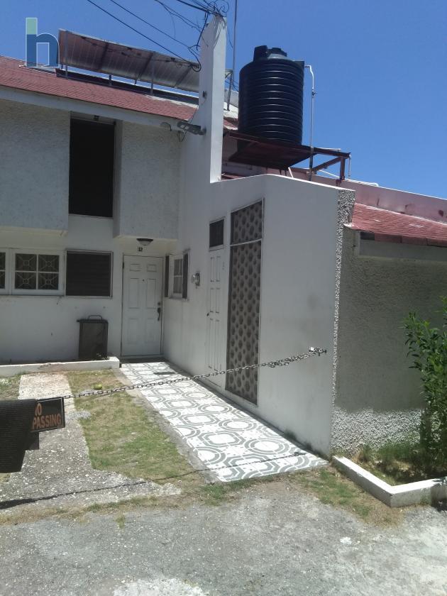 Photo #1 of 11 - Property For Sale at 13  Queens Drive, Queens Mews, Montego bay, jamaic, Top Road, St. James, Jamaica. House with 3 bedrooms and 3 bathrooms at USD $225,000. #406.