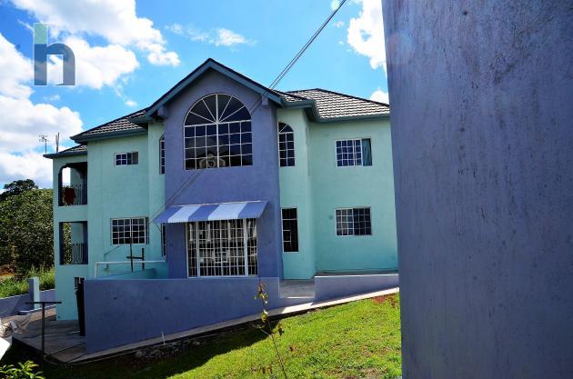 Photo #1 of 5 - Property For Sale at Abbey Gardens, Hatfield, Manchester, Jamaica. House with 5 bedrooms and 6 bathrooms at JMD $52,000,000. #568.