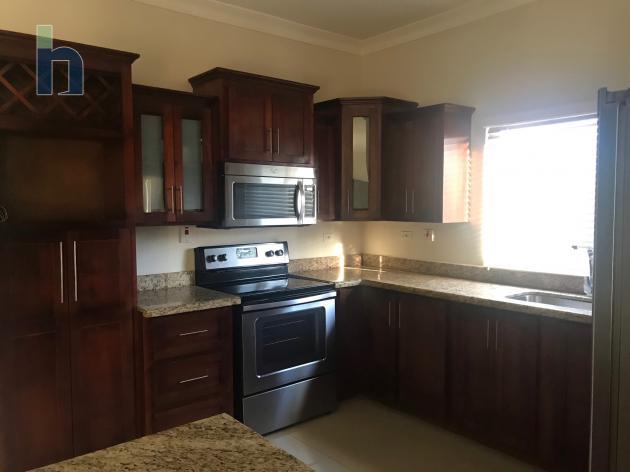 Photo #2 of 19 - Property For Sale at 1 Kings Drive, Barbican, Kingston & St. Andrew, Jamaica. Apartment with 2 bedrooms and 3 bathrooms at USD $251,000. #569.
